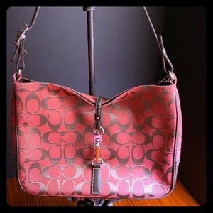 Red and Tan canvass logo small Coach handbag.